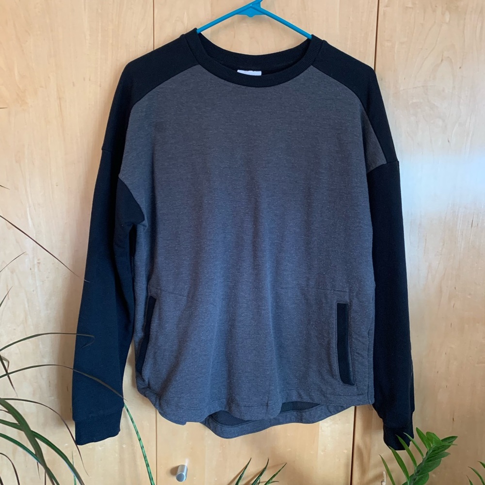 WARM & COZY! Fleece lined crew neck sweatshirt featuring fleece lined pockets.